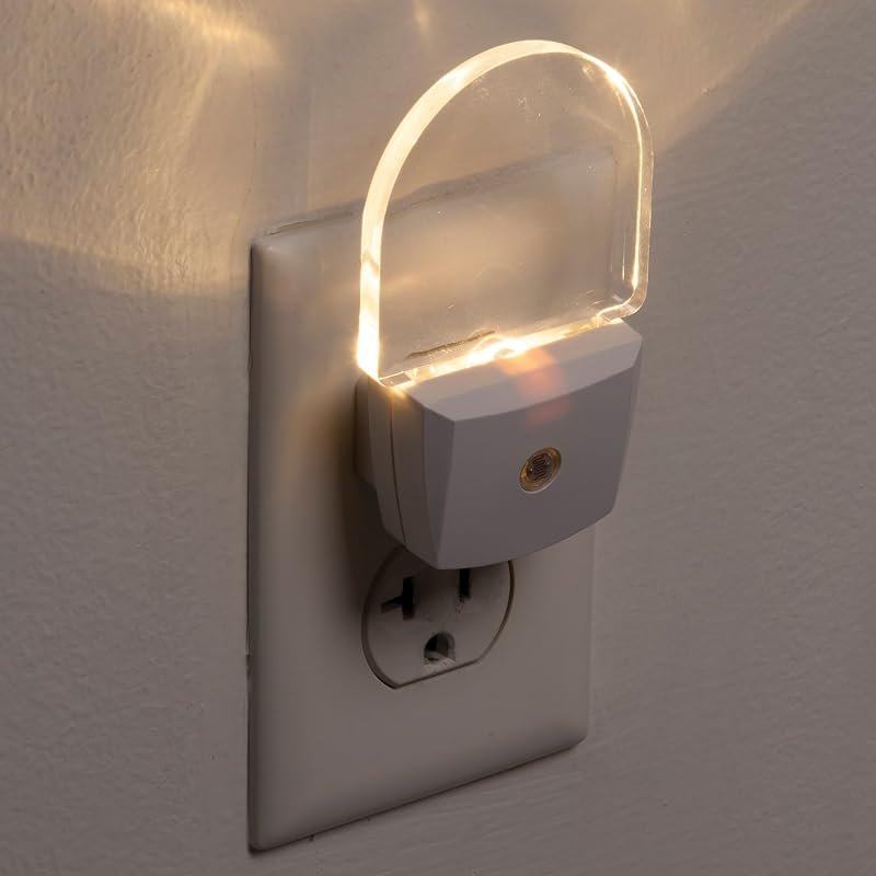 Safety 1st auto sensor LED nightlight glowing warm in a wall outlet