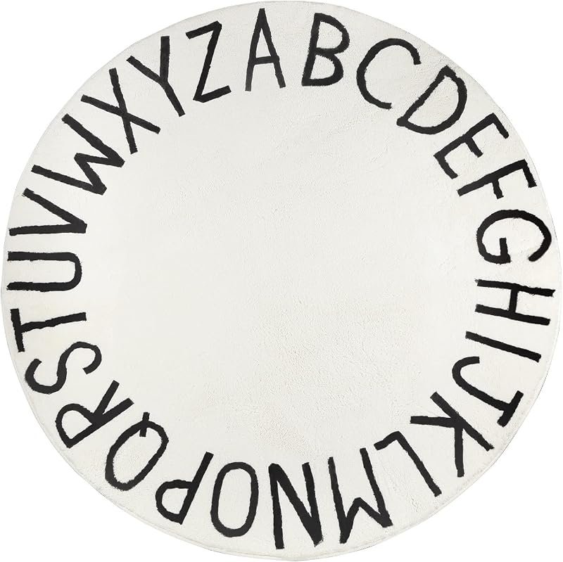 Round white kids area rug with black alphabet letters around the border