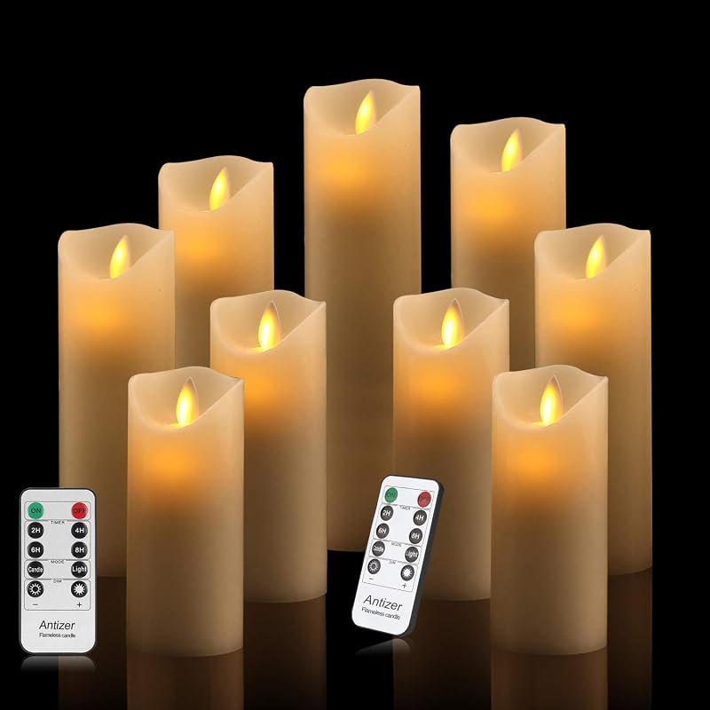Set of nine ivory flameless LED pillar candles with remote control