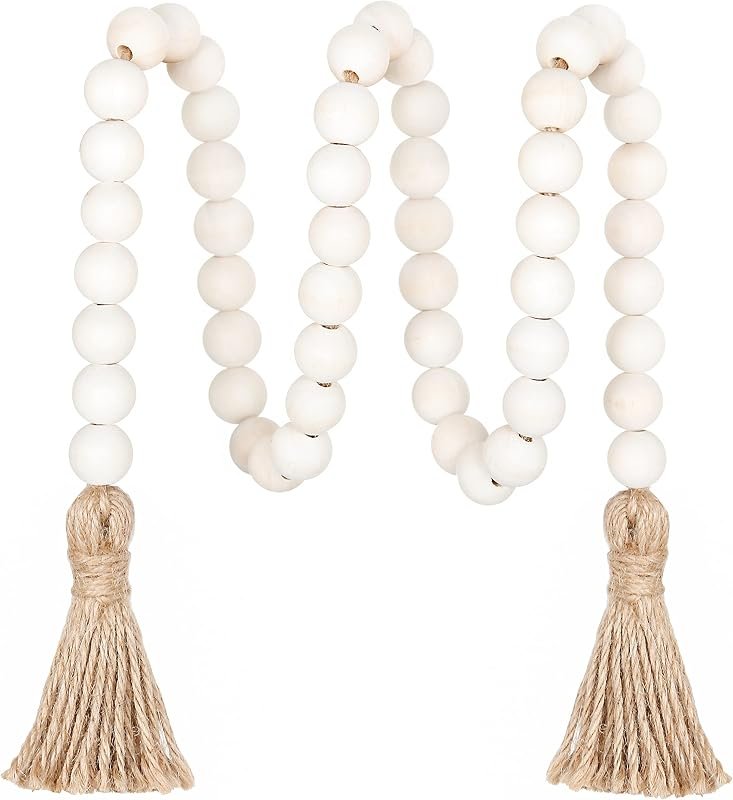 White wooden bead garland with jute tassels on each end